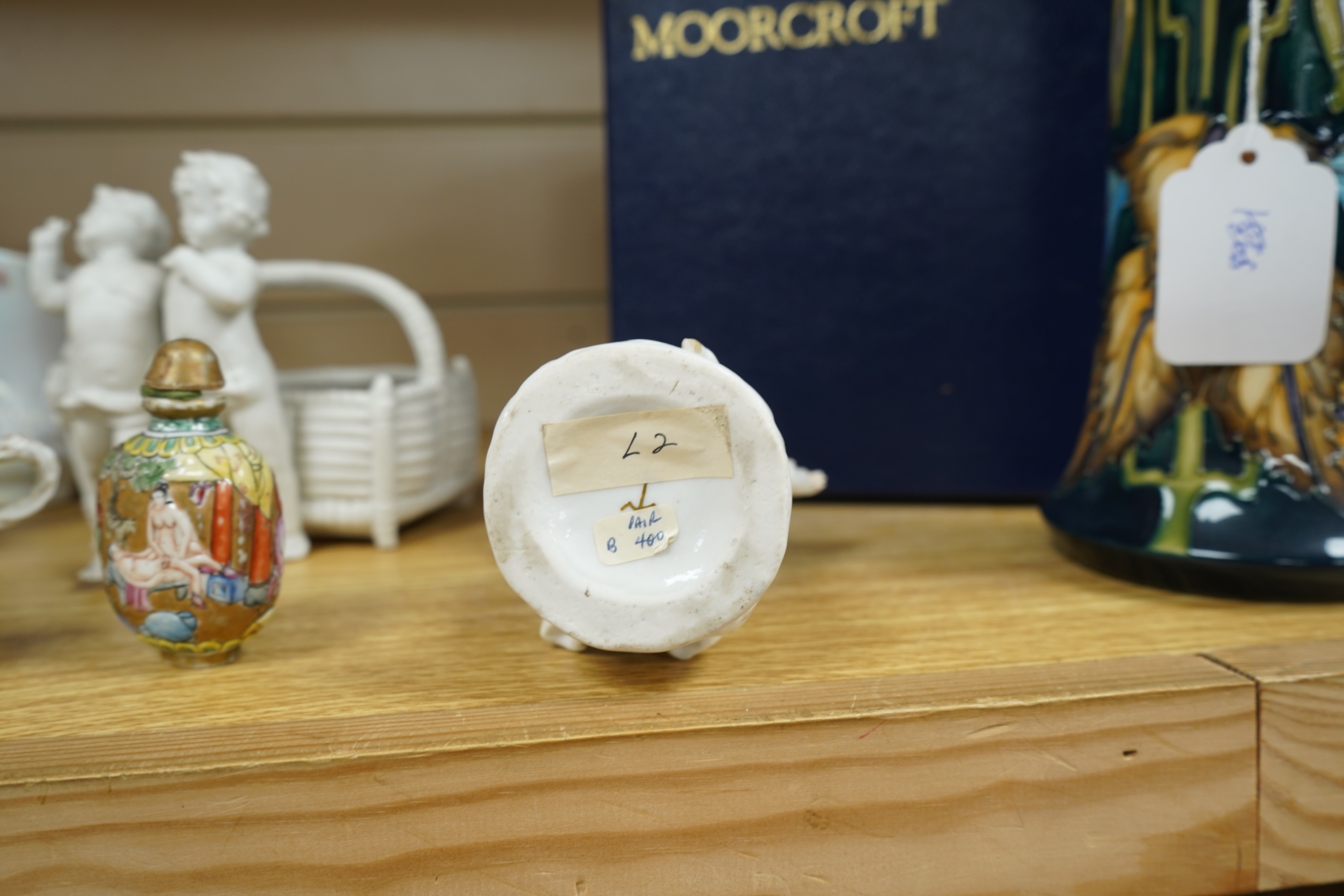 A French porcelain figure of a Mansion House dwarf, various German porcelain figures, an engraved glass and bowl. Glass 19cm